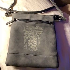 It’s a cross purse only used once.